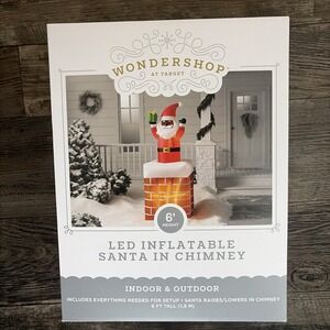 Wondershop LED Inflatable 6' Animated Black Santa Claus in Chimney Holiday Decor